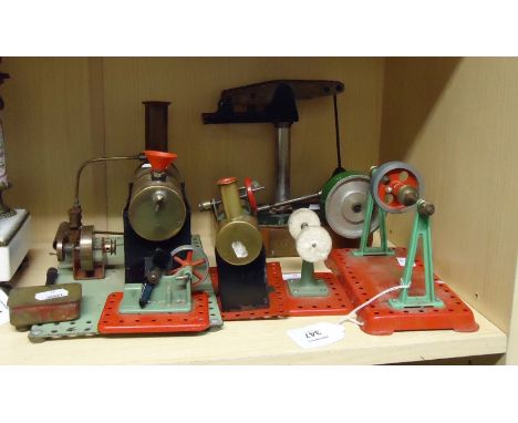 A stationary walking beam engine, two stationary steam engines and associated fly wheels and buffer
