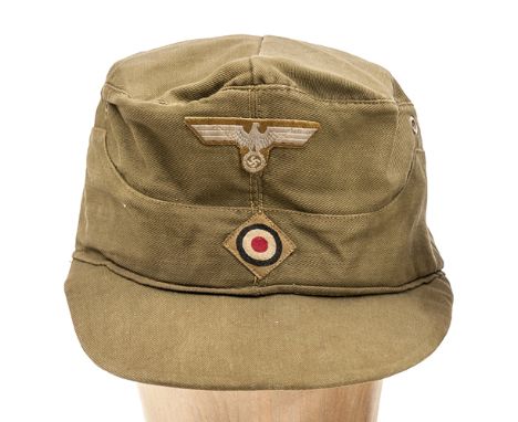 A scarce Third Reich Afrika Korps khaki visored field cap,  with tropical army insignia, red lining with maker’s number and d