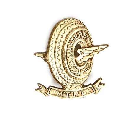 An interesting cast WM badge of the Headquarters Hyderabad Army Motor Transport Platoon, winged wheel with title and scroll, 
