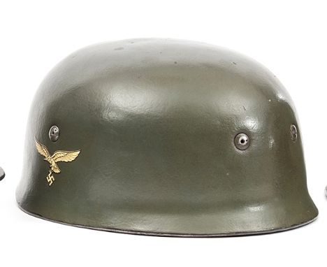 A scarce Third Reich Luftwaffe Paratrooper’s Fallschirmjager double decal steel helmet second model,  spanner bolt liner fixi