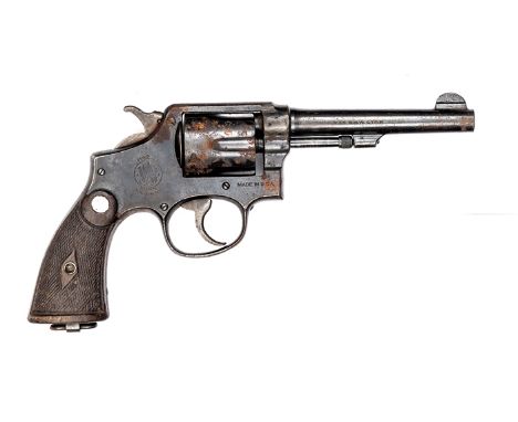 A 6 shot .38” Smith & Wesson service revolver,  number 753638, with British military acceptance marks, the frame stamped “Mad