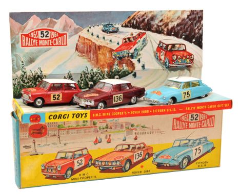 A scarce Corgi Toys Gift Set. No.38 Comprising a B.M.C. Mini Cooper-S in red with white roof and red interior, RN52. A Rover 