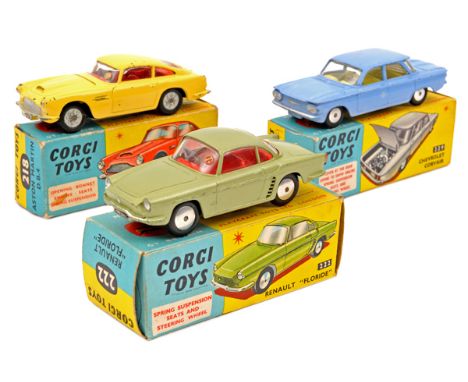 3 Corgi Toys. Aston Martin DB4 (218). An example in yellow with red interior and ‘cast spoked’ wheels. Renault Floride (222) 