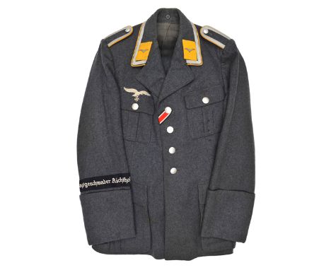 A fine Third Reich Luftwaffe 4 button service tunic, for an Unteroffizier of Flying Troops, complete with cuff title of the J