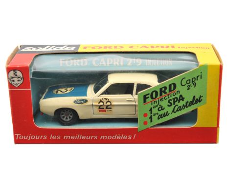 1970’s Solido Mk 1 Ford Capri 2.9i (190). An example in white with a ‘Ford’ blue bonnet, RN22 with ‘Camel’, ‘Ford’ and ‘Castr
