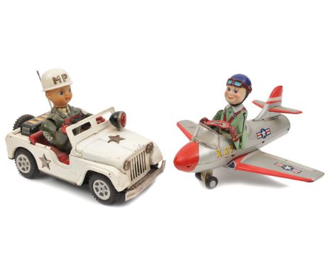 2 battery powered Japanese produced American style toys. An ‘X.27’ US Airforce jet in metallic silver with smiley faced carto