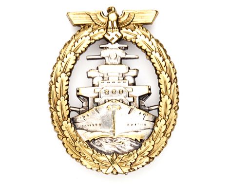 A rare Third Reich High Seas Fleet badge,  gilt eagle and wreath, plated battleship and slightly concave reverse, typical pin