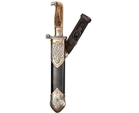 A good Third Reich R.A.D Hewing knife, broad blade 9¾”, etched “Arbeit Adelt” and stamped “Ges Gesch, Carl Eickhorn Solingen,