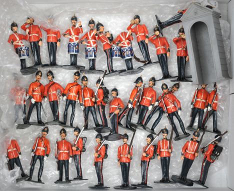 34 white metal soldiers. British Infantry of The Line, in scarlet home service tunics. Comprising 11 piece drum and bugle ban