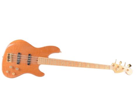 Fender Jazz Bass Guitar, a USA made Fender Jazz Bass with serial number DZ2035810 (2002 construction) - in Tobacco with Maple