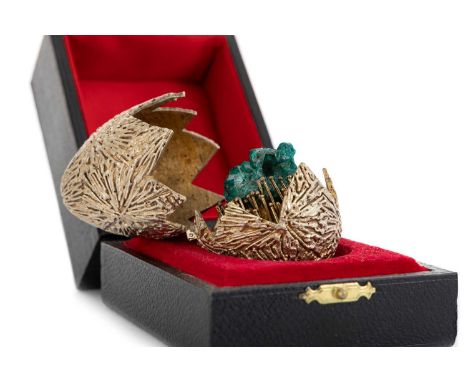 ELIZABETH II SILVER GILT SURPRISE EGG, STUART DEVLIN, LONDON 1971 with textured exterior, the hinged cover opening to reveal 