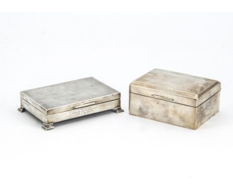 Two mid 20th Century silver cigarette boxes, both with engine turning, one short on bracket supports (2)some dents to the bas