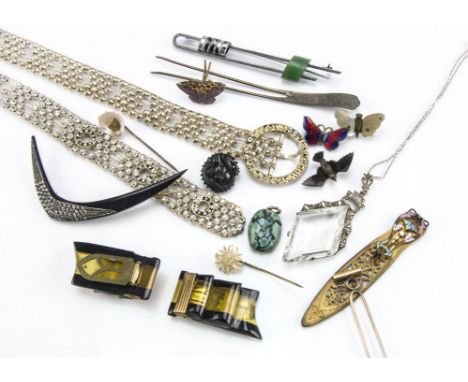 A small collection of jewellery, including a paste set belt, a pair of Art Deco collar clips, a Chinese dragon earring, an en
