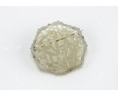 A vintage Chinese hardstone brooch, the octagonal pieced jade style panel with two figures, 3.8cm wide 