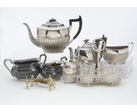 A collection of 19th Century and later silver plated items, including a pair of antler knife rests, a plated and glass cruet 