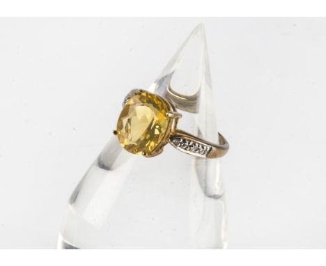 A modern 9ct gold fire opal ring, heightened by diamonds to shoulders, 2.7g and size N 