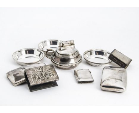 A George V silver table lighter and ashtray set by Walker & Hall, the circular lighter neatly fitting onto four small circula