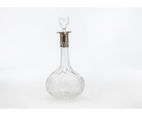 A late Victorian glass and silver mounted claret decanter by William Hutton & Sons, with nicely etched grape and vine design,