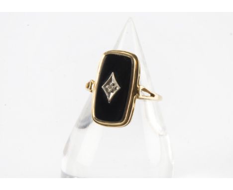 An Art Deco period 10ct gold and onyx dress ring, oblong panel set with a small old cut stone, 2.9g and size Sshank isnt worn