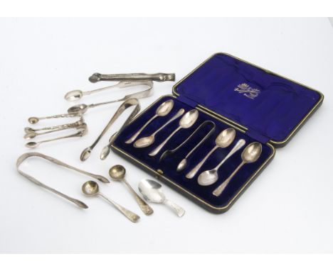 A group of six Georgian and later silver sugar tongs, in various styles, together with a George III silver tea caddy spoon, c