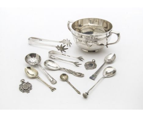 A George V silver sugar basin, having RAF inscription, Sheffield 1918, together with several silver and plated spoons and ton