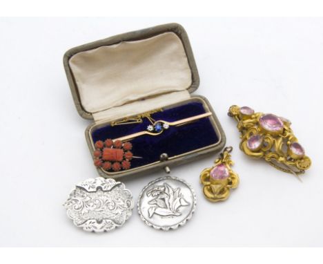 An Art Deco 9ct gold three stone sapphire and diamond bar brooch, in case, together with a Victorian paste set brooch and pen