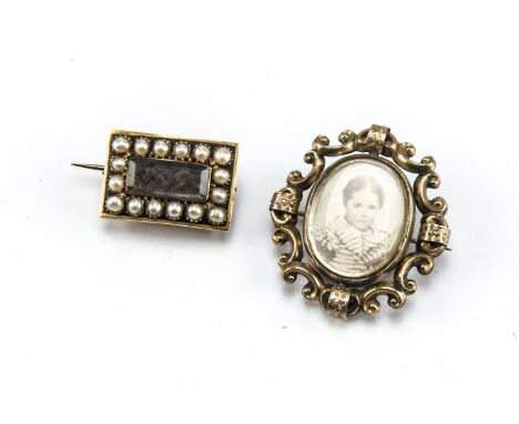A Georgian gold and seed pearl mourning brooch, with plaited hair under glass, together with a Victorian mourning brooch with