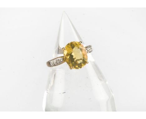 A modern 9ct gold fire opal ring, heightened by diamonds to shoulders, 2.7g and size N 