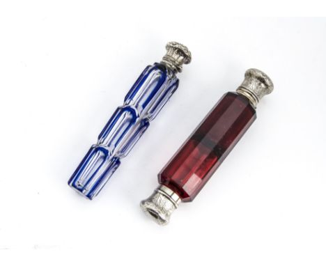 Two Victorian glass and silver scent bottles, one with flashed blue glass, the other a double ended ruby red glass example (2
