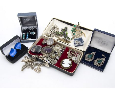 A collection of silver and other jewellery, including a heavy curb link chain charm bracelet, another charm bracelet and loos