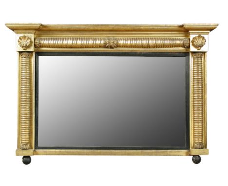A Regency gilt frame overmantel mirror, decorated with turned columns and shell capitals 78 x 118cm (30 x 46in) Original gilt