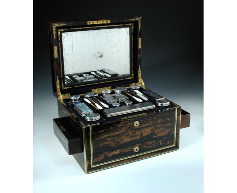 A fine Victorian Coromandel and brass bound lady's dressing case, by Mappin Brothers, containing a selection of fifteen silve