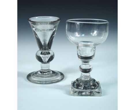 An 18th century illusion glass and a later rummer, the trumpet bowl of the first on teared bun knop and folded foot, 11.5cm (