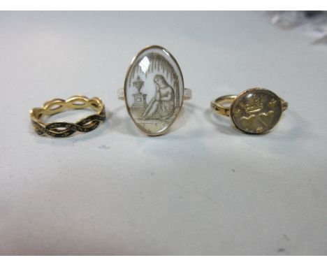 Three 18th century memorial rings, the first with an oval grisaille-painted ivory plaque depicting a grieving woman by an urn