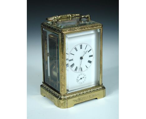 Japy Freres, a gilt brass repeating carriage clock with centre seconds and alarm, 19th century, the engraved one piece case w