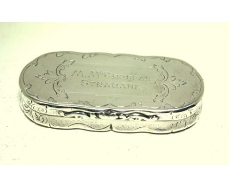 A Victorian silver snuff box, possibly by George Wheeler & Co, Birmingham 1861, of oblong form with serpentine edges, scrolle