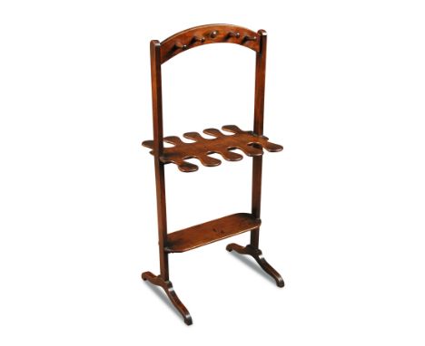 A Regency mahogany boot and whip rack, with arched top and undertier and another larger rack, 116cm x 62cm (45.5 x 24.5in) (2