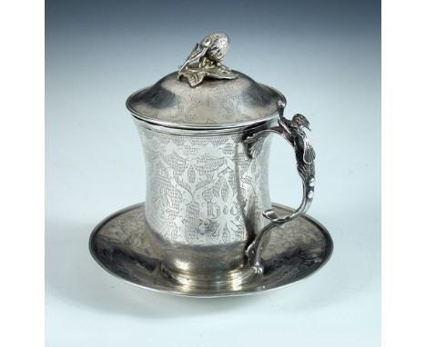 A late 19th/early 20th century Ottoman silver sahlep cup and cover, with saucer, tughra mark from the Ottoman empire prior to