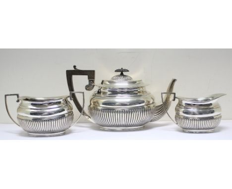 A Victorian matched silver three piece teaset, comprising:- a teapot by William Charles Fordham & Albert Buckley Faulkner, Sh