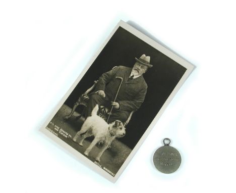 Caesar, the dog tag of King Edward VII's Wire Fox Terrier, inscribed 'Caesar - I belong to the King', the circular tag with s