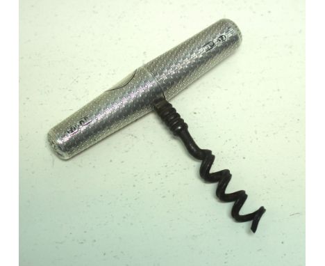 A Victorian silver handled corkscrew, by Thomas Johnson I, London 1866, the engine turned tapered handle is threaded in two p