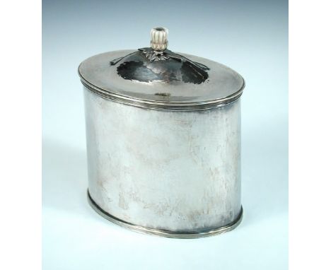 A silver tea caddy, by A H Jephcott & Son, Birmingham 1930, of oval shape with hand beaten finish between reeded edges, pull-