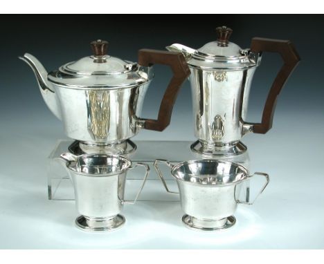 A silver four-piece tea service, by Charles S Green & Co Ltd, Birmingham 1945, comprising a teapot of circular tapering form 