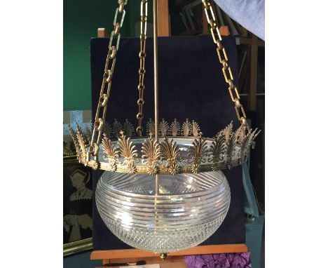 An Empire style hobnail cut glass and brass ceiling light, the glass bowl within a brass frame and suspended from three long 