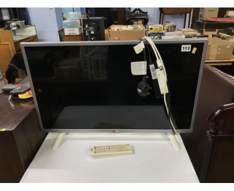 An LG TV, with remote, 27 inches, model number 28LB490U-ZH