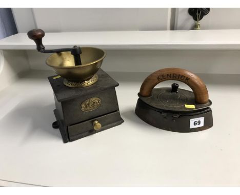 A flat iron and a coffee grinder