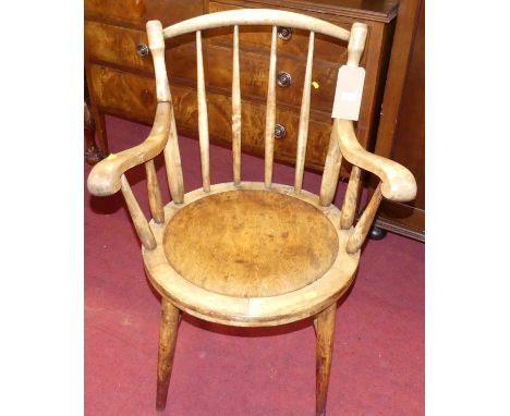 An early 20th century elm and beech panelled seat stick back elbow chair, width 62cm
