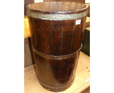 A rustic stained and coopered hardwood cylindrical stick stand, height 55cm
