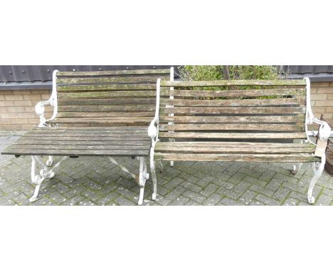 A pair of white painted galvanised metal and teak slatted two-seater garden benches, together with conforming low occasional 