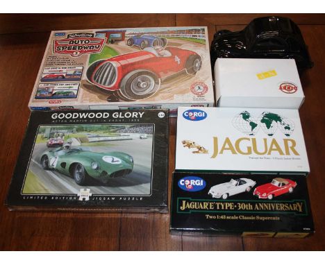 A tray containing Corgi Jaguar E-type 30th Anniversary, limited edition 1000 piece jigsaw puzzle, ceramic model of a Citroen 